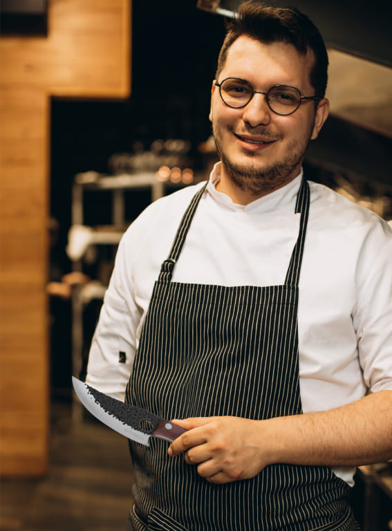 Bernard Descoteaux con il Coltello Huusk